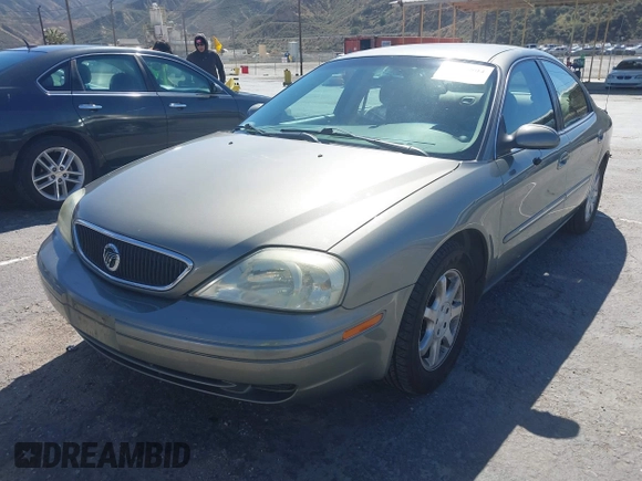 2002 Mercury Sable GS with VIN 1MEFM50U92A613552, listed as a IAAI auction lot 41718804 with 211,661 mi miles. Bid and sale history available at carsss.com. Image 2.