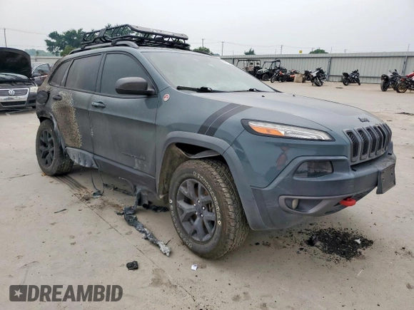2015 Jeep Cherokee Trailhawk with VIN 1C4PJMBS9FW576340, listed as a Copart auction lot 57108045 with Not provided miles and Non repairable. Bid and sale history available at DreamBid. Image 4.
