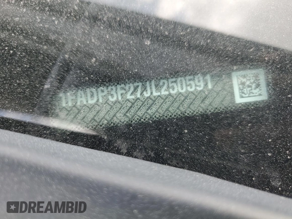 2018 Ford Focus SE z VIN 1FADP3F27JL250591, wystawiony jako Copart lot #54989245 z przebiegiem 85 838 mil mil oraz Szkoda całkowita • Salvage title. Historia ofert i sprzedaży dostępna na DreamBid. Obrazek 12.