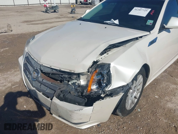 2011 Cadillac CTS Luxury z VIN 1G6DF5EY0B0148425, wystawiony jako IAAI lot #41207725 z przebiegiem 246 606 mil mil oraz . Historia ofert i sprzedaży dostępna na DreamBid. Obrazek 6.