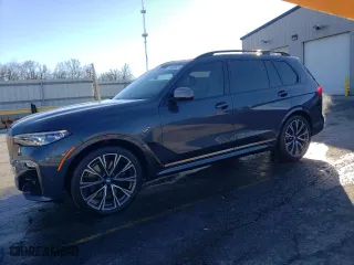 2021 BMW X7 M50i with VIN 5UXCX6C04M9H77100, listed as a Copart auction lot 83420524 with 56,089 mi miles and Salvage Title. Bid and sale history available at carsss.com. Image 1.