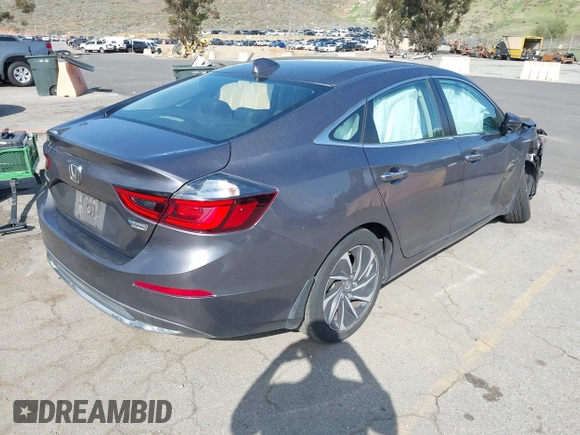 2019 Honda Insight Touring with VIN 19XZE4F95KE001192, listed as a IAAI auction lot 41956216 with Not Provided miles and . Bid and sale history available at carsss.com. Image 4.