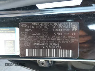 2015 Kia Optima Hybrid with VIN KNAGM4AD3F5088949, listed as a IAAI auction lot 41008816 with 138,921 mi miles. Bid and sale history available at carsss.com. Image 9.