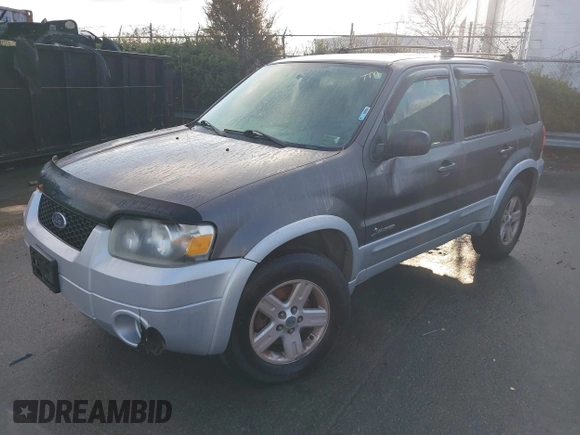 2006 Ford Escape Hybrid with VIN 1FMYU96H26KA19747, listed as a IAAI auction lot 41496607 with 247,629 mi miles and . Bid and sale history available at DreamBid. Image 2.