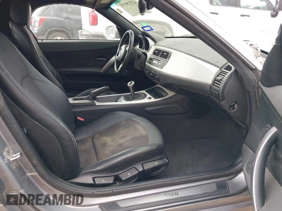 2006 BMW Z4 3.0i with VIN 4USBU33516LW59003, listed as a IAAI auction lot 42578979 with 82,386 mi miles and . Bid and sale history available at DreamBid. Image 5.