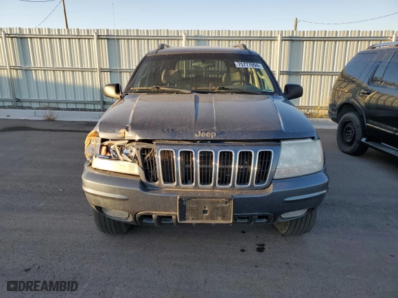 2003 Jeep Grand Cherokee Limited with VIN 1J4GW58N03C561385, listed as a Copart auction lot 75777094 with 169,705 mi miles and Salvage Title. Bid and sale history available at carsss.com. Image 5.