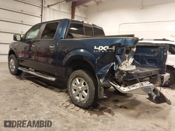 2014 Ford F-150 XL with VIN 1FTFW1ET1EKD06590, listed as a IAAI auction lot 41217519 with 155,792 mi miles and . Bid and sale history available at DreamBid. Image 3.