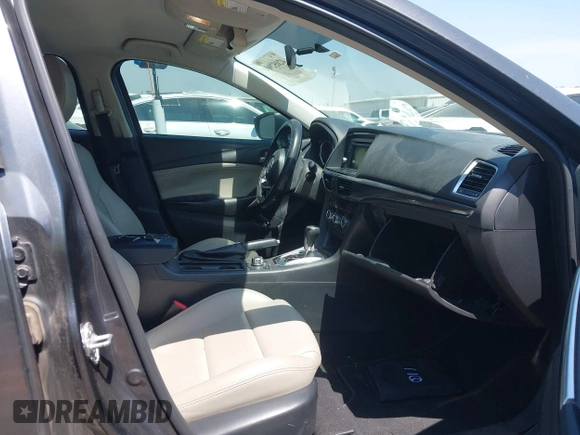 2014 Mazda Mazda6 i Touring with VIN JM1GJ1V6XE1154862, listed as a IAAI auction lot 42052904 with 301,752 mi miles. Bid and sale history available at carsss.com. Image 5.