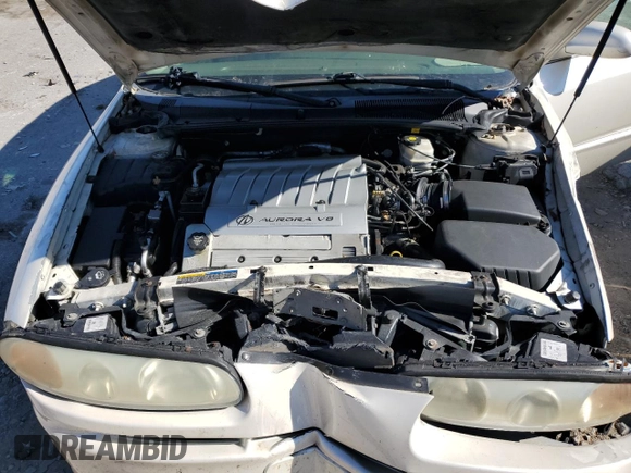 2003 Oldsmobile Aurora z VIN 1G3GS64C034160957, wystawiony jako Copart lot #76566524 z przebiegiem Nie podano mil oraz Szkoda całkowita • Salvage title. Historia ofert i sprzedaży dostępna na DreamBid. Obrazek 11.