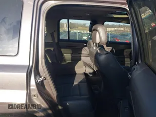 2016 Jeep Patriot Latitude with VIN 1C4NJRFB9GD627671, listed as a IAAI auction lot 41858695 with 999,999 mi miles. Bid and sale history available at carsss.com. Image 8.