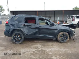 2016 Jeep Cherokee Latitude with VIN 1C4PJLCSXGW229710, listed as a IAAI auction lot 41094091 with 131,501 mi miles. Bid and sale history available at carsss.com. Image 13.