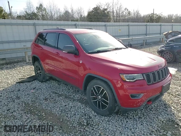 2017 Jeep Grand Cherokee Trailhawk with VIN 1C4RJFLT0HC667691, listed as a Copart auction lot 42041705 with 129,757 mi miles and Salvage title. Bid and sale history available at DreamBid. Image 12.