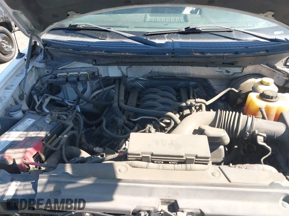 2014 Ford F-150 XL with VIN 1FTNF1CF5EKF62031, listed as a IAAI auction lot 41657632 with 216,689 mi miles and . Bid and sale history available at DreamBid. Image 10.
