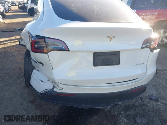 2023 Tesla Model Y Long Range with VIN 7SAYGAEE3PF753657, listed as a IAAI auction lot 41668917 with 33,301 mi miles and . Bid and sale history available at DreamBid. Image 22.