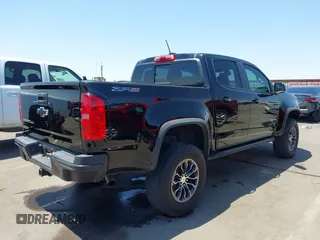 2018 Chevrolet Colorado 4WD ZR2 z VIN 1GCGTEEN5J1259764, wystawiony jako IAAI lot #42474810 z przebiegiem 111 187 mil mil oraz . Historia ofert i sprzedaży dostępna na DreamBid. Obrazek 4.