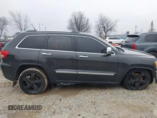 2011 Jeep Grand Cherokee Overland with VIN 1J4RR6GT5BC629412, listed as a IAAI auction lot 41741813 with 156,122 mi miles and . Bid and sale history available at DreamBid. Image 14.