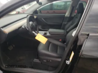 2022 Tesla Model Y Long Range z VIN 7SAYGDEEXNA008898, wystawiony jako Copart lot #54915445 z przebiegiem 35 467 mil mil oraz Szkoda całkowita • Salvage title. Historia ofert i sprzedaży dostępna na DreamBid. Obrazek 7.