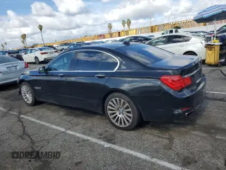 2012 BMW 7 Series 750i with VIN WBAKA8C57CDS99976, listed as a Copart auction lot 45202715 with 152,169 mi miles and Salvage title. Bid and sale history available at DreamBid. Image 2.