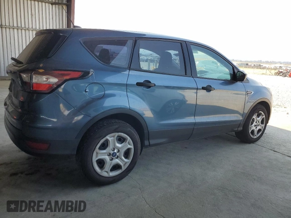 2018 Ford Escape S with VIN 1FMCU0F79JUB86844, listed as a Copart auction lot 64446735 with 155,329 mi miles and Salvage title. Bid and sale history available at DreamBid. Image 3.