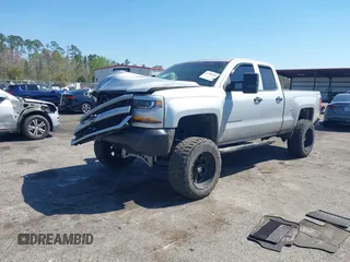 2016 Chevrolet Silverado 1500 Custom with VIN 1GCVKPEC1GZ322549, listed as a IAAI auction lot 41789704 with 162,953 mi miles. Bid and sale history available at carsss.com. Image 2.