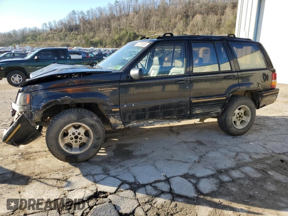 1994 Jeep Grand Cherokee Limited with VIN 1J4GZ78S0RC357283, listed as a Copart auction lot 49236995 with 84,306 mi miles and Salvage title. Bid and sale history available at DreamBid. Image 1.