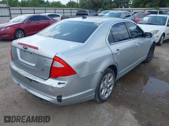 2011 Ford Fusion SE with VIN 3FAHP0HA0BR305471, listed as a IAAI auction lot 42099320 with 175,089 mi miles. Bid and sale history available at carsss.com. Image 4.