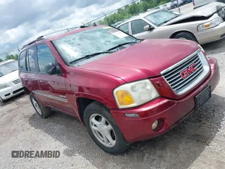 2006 GMC Envoy SLE z VIN 1GKDT13S262222939, wystawiony jako IAAI lot #42210957 z przebiegiem 238 217 mil mil oraz . Historia ofert i sprzedaży dostępna na DreamBid. Obrazek 1.