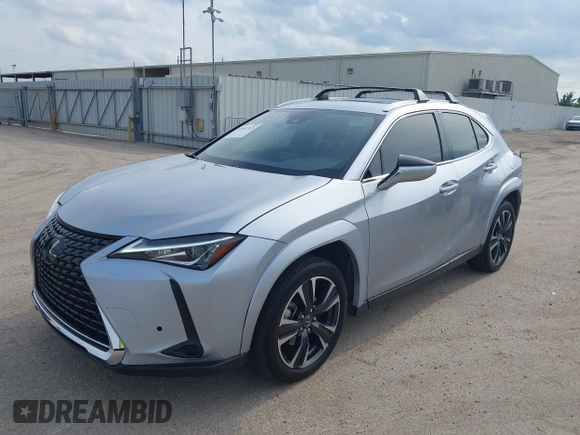 2023 Lexus UX 250h Premium z VIN JTHP6JBH5P2145912, wystawiony jako IAAI lot #42401353 z przebiegiem 14 252 mil mil oraz . Historia ofert i sprzedaży dostępna na DreamBid. Obrazek 17.