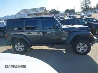 2018 Jeep Wrangler Unlimited Sport S z VIN 1C4HJXDG4JW132547, wystawiony jako IAAI lot #41838010 z przebiegiem 69 987 mil mil oraz . Historia ofert i sprzedaży dostępna na DreamBid. Obrazek 13.