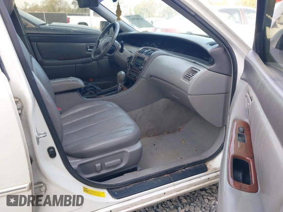 2002 Toyota Avalon XL with VIN 4T1BF28B32U266015, listed as a IAAI auction lot 41907532 with 347,005 mi miles and . Bid and sale history available at DreamBid. Image 5.