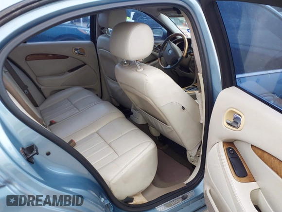 2003 Jaguar S-Type with VIN SAJEA01U33HM70079, listed as a IAAI auction lot 41939388 with 147,975 mi miles and . Bid and sale history available at DreamBid. Image 8.