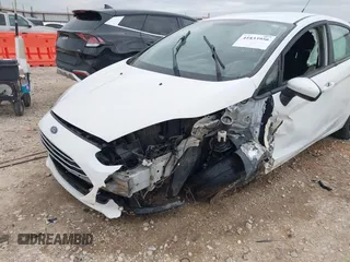 2018 Ford Fiesta S with VIN 3FADP4AJ8JM124873, listed as a IAAI auction lot 41833956 with 86,759 mi miles and . Bid and sale history available at DreamBid. Image 6.