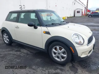 2007 MINI Hardtop with VIN WMWMF33547TT53274, listed as a IAAI auction lot 41120494 with 189,421 mi miles and . Bid and sale history available at DreamBid. Image 1.