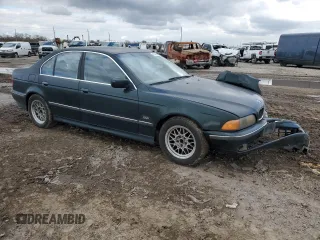 2000 BMW 5 Series 528iA with VIN WBADM6346YGU20515, listed as a Copart auction lot 43608485 with 197,903 mi miles and Salvage Title. Bid and sale history available at carsss.com. Image 4.