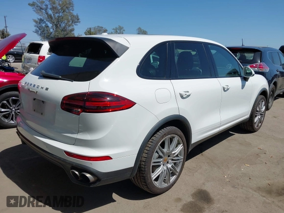 2016 Porsche Cayenne S E-Hybrid with VIN WP1AE2A25GLA63734, listed as a IAAI auction lot 42549379 with 155,065 mi miles and . Bid and sale history available at DreamBid. Image 4.