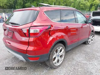 2019 Ford Escape Titanium with VIN 1FMCU9J97KUC08287, listed as a IAAI auction lot 42702548 with 45,207 mi miles and . Bid and sale history available at DreamBid. Image 4.