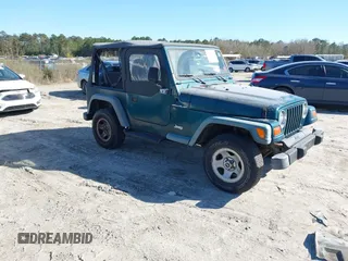 1997 Jeep Wrangler SE with VIN 1J4FY29P2VP492327, listed as a IAAI auction lot 41824808 with 156,646 mi miles. Bid and sale history available at carsss.com. Image 1.