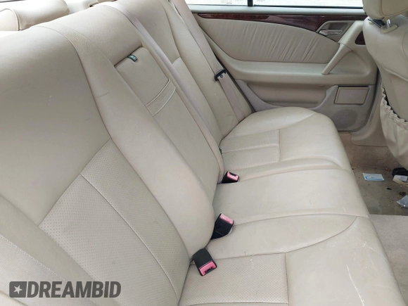 1999 Mercedes-Benz E-Class with VIN WDBJF82H3XX025608, listed as a IAAI auction lot 41606211 with 182,293 mi miles. Bid and sale history available at carsss.com. Image 8.