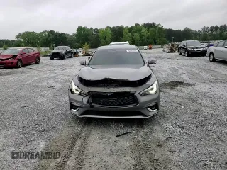 2019 Infiniti Q50 Luxe z VIN JN1EV7AR4KM559305, wystawiony jako Copart lot #54353455 z przebiegiem 85 131 mil mil oraz Nie do naprawy • Non repairable. Historia ofert i sprzedaży dostępna na DreamBid. Obrazek 13.