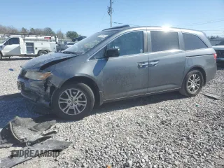2013 Honda Odyssey EX-L with VIN 5FNRL5H6XDB015049, listed as a Copart auction lot 48691415 with 150,480 mi miles and Salvage Title. Bid and sale history available at DreamBid. Image 1.