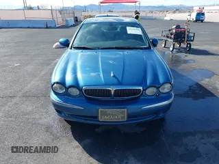 2002 Jaguar X-Type with VIN SAJEA51C42WC11103, listed as a IAAI auction lot 41699366 with 106,418 mi miles and . Bid and sale history available at DreamBid. Image 6.