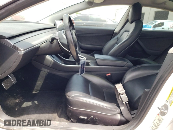 2018 Tesla Model 3 Long Range Battery with VIN 5YJ3E1EAXJF031944, listed as a Copart auction lot 53619445 with 146,031 mi miles and Salvage Title. Bid and sale history available at DreamBid. Image 7.