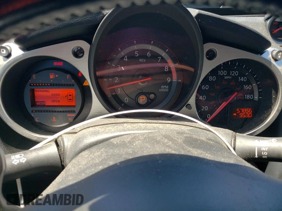 2014 Nissan 370Z Nismo with VIN JN1AZ4EH7EM633324, listed as a Copart auction lot 53812335 with 57,856 mi miles and Salvage Title. Bid and sale history available at DreamBid. Image 9.