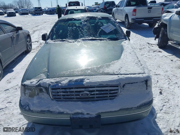 2005 Ford Crown Victoria LX with VIN 2FAFP74W85X131494, listed as a IAAI auction lot 41620849 with 127,245 mi miles. Bid and sale history available at carsss.com. Image 14.