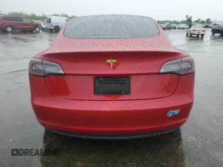 2021 Tesla Model 3 Standard Range Plus with VIN 5YJ3E1EA9MF870214, listed as a Copart auction lot 47702535 with 46,486 mi miles and Salvage Title. Bid and sale history available at DreamBid. Image 6.