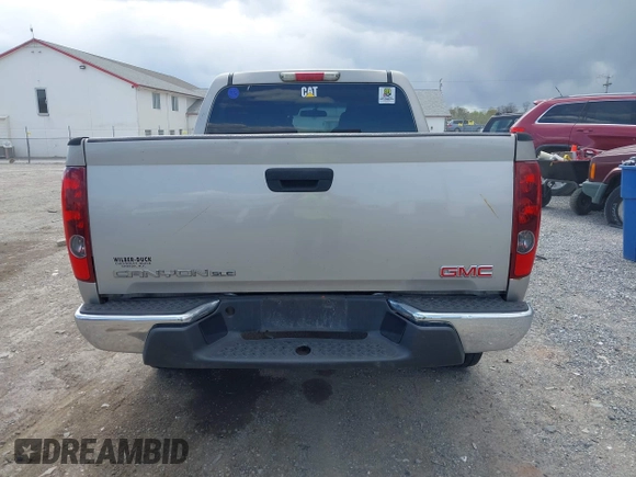 2009 GMC Canyon SLE1 z VIN 1GTDT13E398100890, wystawiony jako IAAI lot #42030572 z przebiegiem 160 181 mil mil oraz . Historia ofert i sprzedaży dostępna na DreamBid. Obrazek 16.