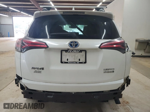 2016 Toyota RAV4 Limited with VIN JTMDJREV9GD014991, listed as a Copart auction lot 61238115 with Not provided miles and Salvage title. Bid and sale history available at DreamBid. Image 6.