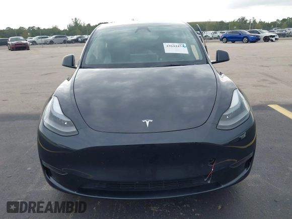 2024 Tesla Model Y z VIN 7SAYGDED3RF041788, wystawiony jako IAAI lot #42644453 z przebiegiem 22 189 mil mil oraz . Historia ofert i sprzedaży dostępna na DreamBid. Obrazek 12.