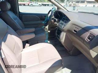 2001 Toyota Sienna LE with VIN 4T3ZF13C21U397063, listed as a IAAI auction lot 42033574 with 219,783 mi miles. Bid and sale history available at carsss.com. Image 5.