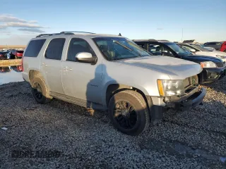 2012 Chevrolet Tahoe LS with VIN 1GNSCAE05CR202824, listed as a Copart auction lot 41580175 with 200,955 mi miles and Salvage title. Bid and sale history available at DreamBid. Image 4.